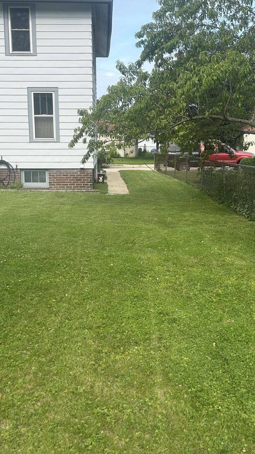 Clean side yard with a finished look